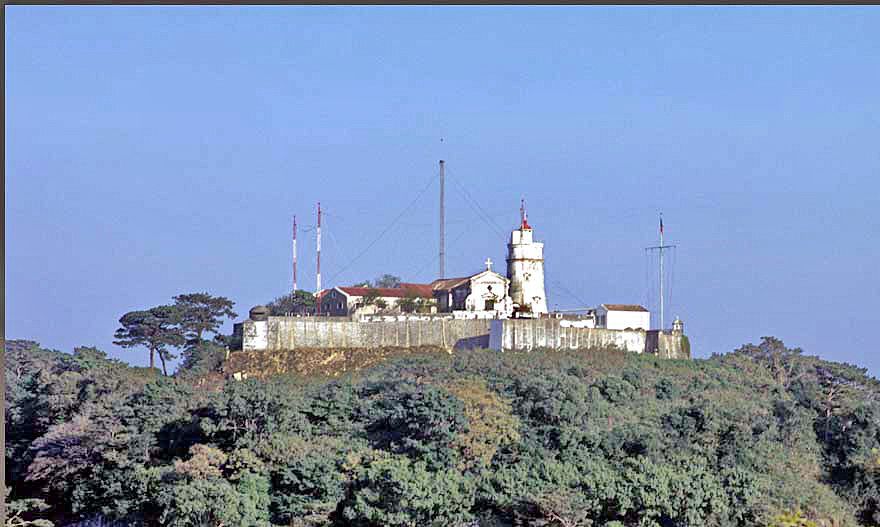 1973-17-010 Fortaleza da Guia, - the Guia Fort (Photography © Karsten Petersen)  Here, - on the highest point of the colony -, the Portuguese built the Guia Fort, - Fortaleza da Guia -, in 1638.  Also within the fort is the Guia lighthouse, - Farol da Guia -, and the Chapel of our lady of Guia.