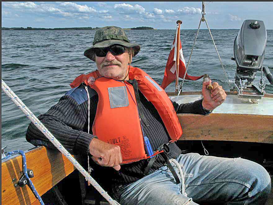 The Webmaster - Karsten Petersen - in his classic Nordic Folkboat - 