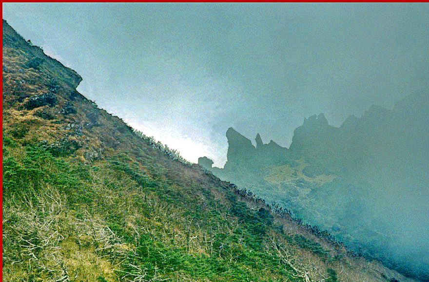1991-10-009  -  Hallasan - from inside the crater, - ghostlike clouds rolling in - (Photography by Karsten Petersen)