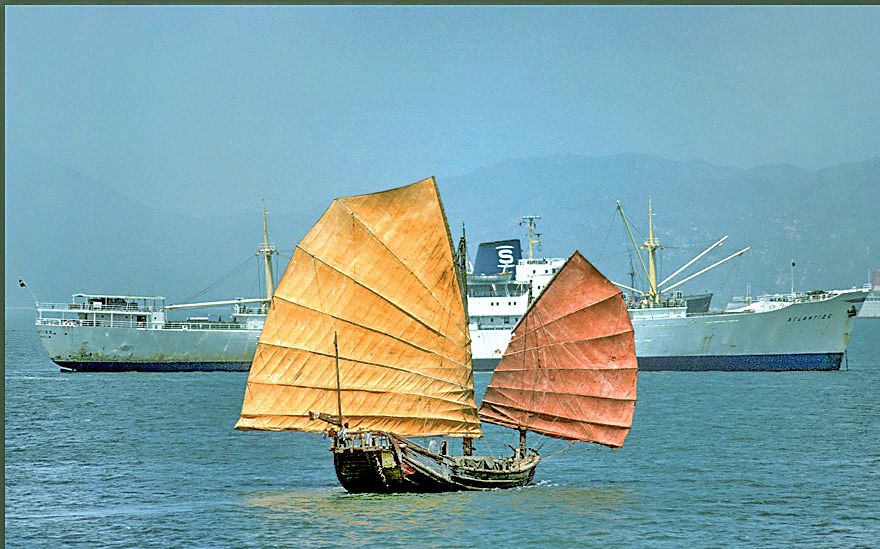 1977-04-042  - Chinese Junk - in Hong Kong harbour, - April 1977 - - behind is the beautiful 8300 TDW Swedish reefer, - 