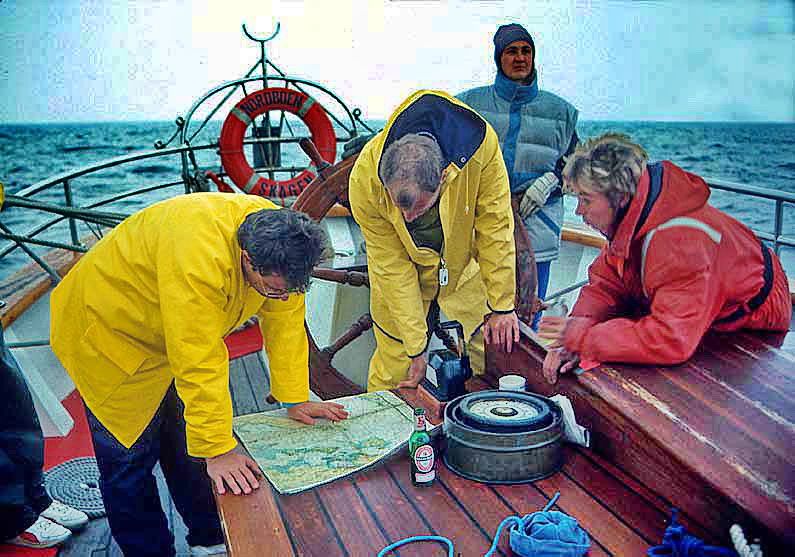 - and learning the secrets of reading a chart - and the mystery of a compass, - the most important nautical instrument of all - - -(Photography by Karsten Petersen)