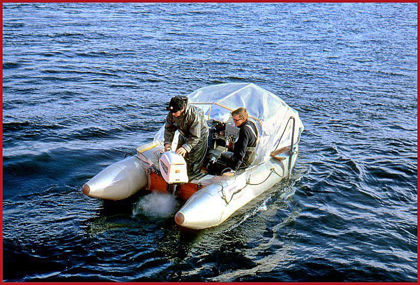 A closer view of a rubber boat with echo sounder equipment Peter navigating the boat, while Jan Walseth is in charge of the equipment - (Photography by Karsten Petersen ©)