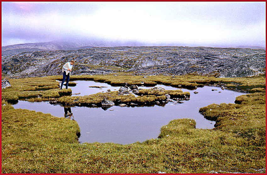 SKA 4 Engineer Karsten Petersen, - the web master. - exploring a lake on top of a plateau - any frogs here??? - (Photography by 