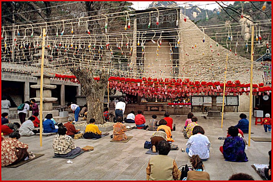1996-34-014 - Doseon-sa temple - the court yard with the old and famous Doseon-sa Buddha statue - (Unfortunately only his body is seen on this picture, - but I do not have a better picture!) (Photography by Karsten Petersen)