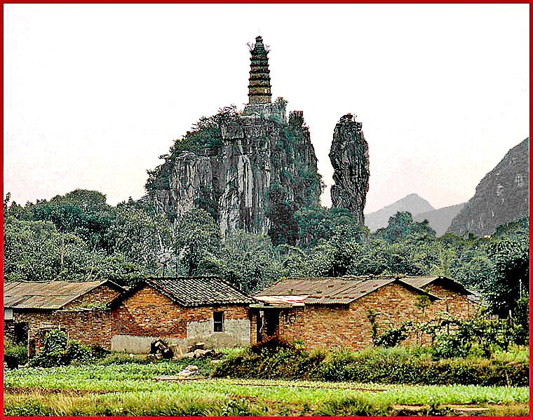 2003-16-031  - The Chuan Shan Gong pagoda near Guilin - another very Chinese thing - built at an impossible place - - -