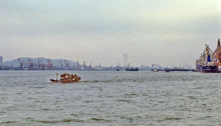 2002-03-040  - View from the local ferry to Danes Island - Pearl River , - and the endless Whampoa docks in the background - (Photo- and copyright:  Karsten Petersen)