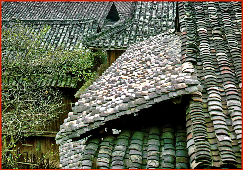 2003-18-024  - Dong Village Here some roof constructions seen from a house where we were invited inside. This picture is also from the village Ping  -  (Photo- and copyright: Karsten Petersen)