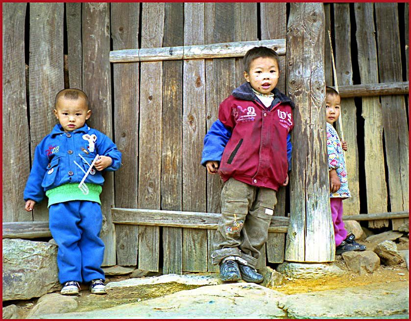Film-1 Frame-13  - The Dong People - half scared, - half curious boys in village Ping - (Photo- and copyright: Karsten Petersen)