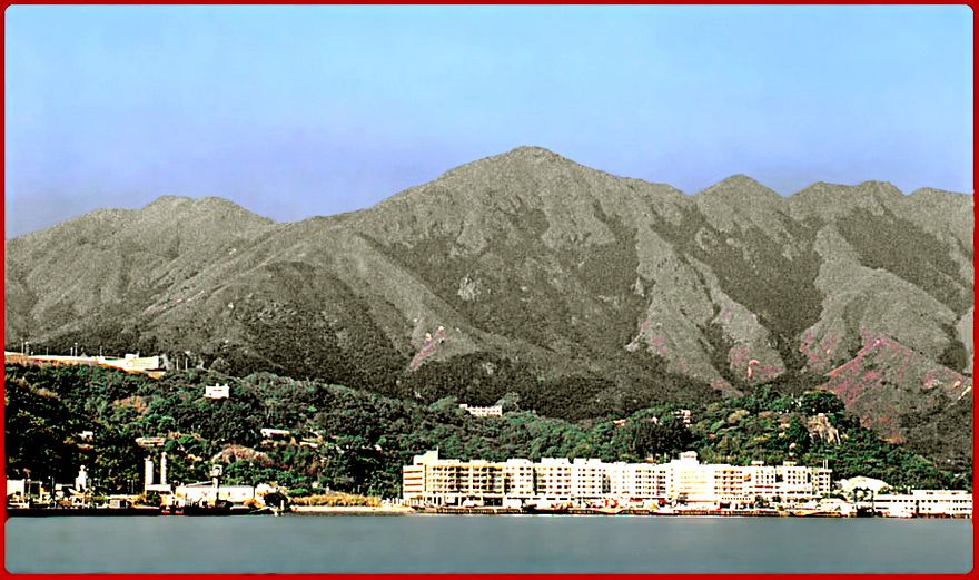 1997-05-038  - Tai Tung Shan - village Mui Wo, - Silvermine Bay -, and Tai Tung Shan to the left in the background - Photographed from the ferry in 1979 (Photo- and @ Karsten Petersen)