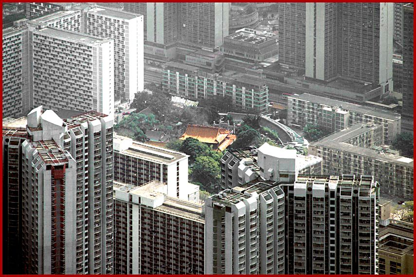 1997-02-035  - Wong Tai Sin, - as seen from Lion Rock. - here a closer look at the magnificent Wong Tai Sin Temple surrounded by high rise apartments - (Photo- and copyright: Karsten Petersen)