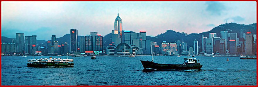 1997-12-031  - Dusk over the Hong Kong waterfront, - and the lights start to come on - (Photo- and copyright: Karsten Petersen)