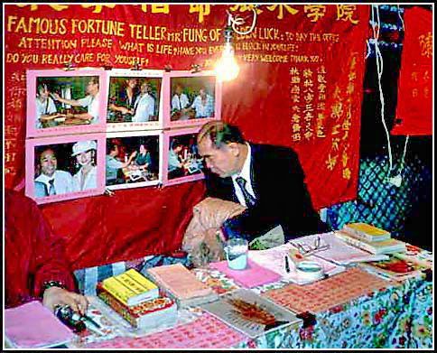 Hong Kong fortune teller - date and place not known at the moment.  I do - however - have a feeling that it could be from the Wong Tai Sin temple, which has a long curved alleyway full of fortune tellers, - and therefore it could be in the seventies.  - (Photo- and copyright:  Karsten Petersen)