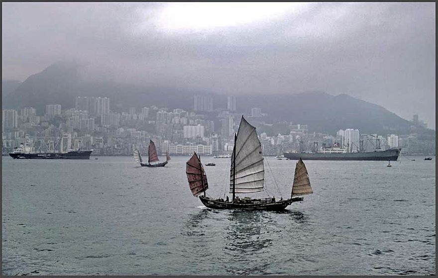 1972-02-083 -  Chinese junks and cargo ships in Hong Kong's Victoria harbour in 1972 -  (Photo- and copyright: Karsten Petersen ©)