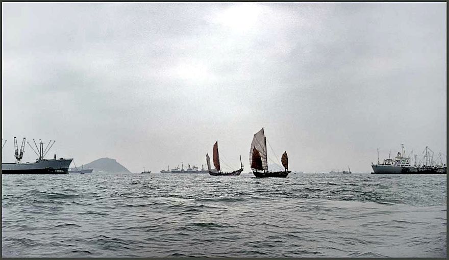 1972-02-084 -  Chinese junks and cargo ships in Hong Kong's Victoria harbour in 1972 -  (Photo- and copyright: Karsten Petersen ©)