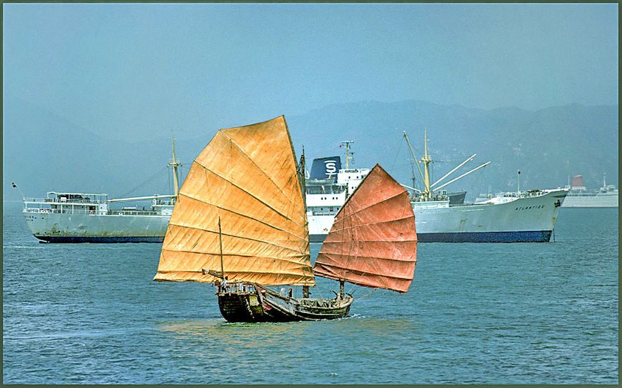 1977-04-042  - Chinese Junk - in Hong Kong harbour, - April 1977 - - behind is the beautiful 8300 TDW Swedish reefer, - 
