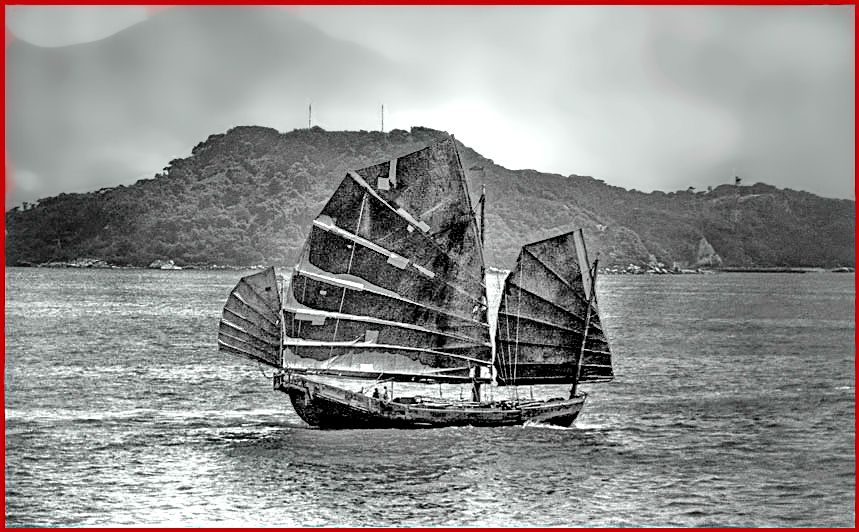 KO412-frame 11  -  Chinese Junk - in Hong Kong Harbour, 1977 - - behind is Stonecutters Island, which is now levelled and not an island anymore, but part of the container terminal - (Photo- and copyright: Karsten Petersen)