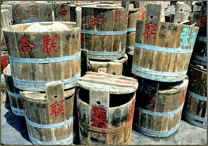 1977-03-006  -  Aberdeen Harbour detail - fish drums with markings indicating ownership, - Aberdeen Harbour, Hong Kong -, March 27. 1977 - (Photo- and copyright:  Karsten Petersen ©)