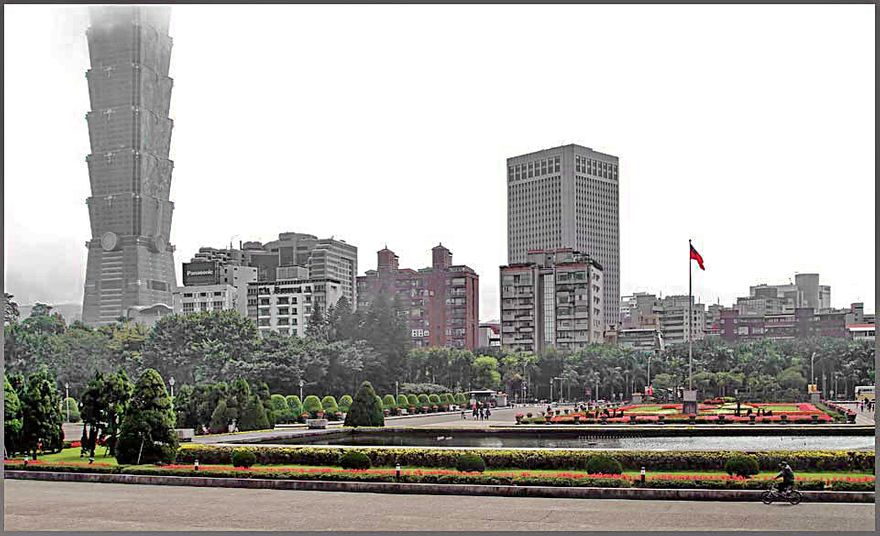 2012-02-29.035  - The Chung-shan park in the middle of Taipei. Take note of the tall building to the left, disappearing in the clouds.  It is the 