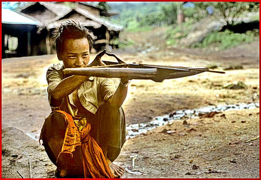 Another Meo hunter proudly demonstrating his weapon to me, - a crossbow  -  (Photo- and copyright:   Karsten Petersen)