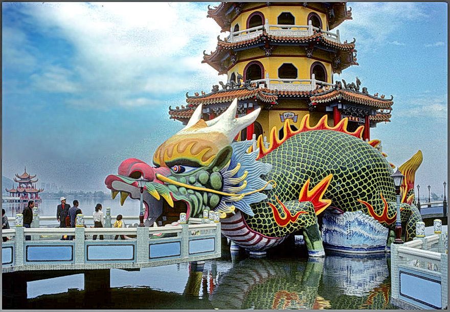 1977-01-081  -   The Dragon and Tiger Pagodas. The Dragon and Tiger are hollow, - and serve as access to the pagodas It is supposed to bring good luck if you enter through the Dragon, - and leaves through the Tiger  -  (Photo- and copyright:   Karsten Petersen ©)